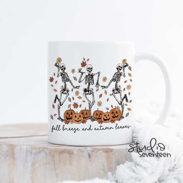 Fall Breeze and Autumn Leaves Halloween Mug with Skeletons and Pumpkins