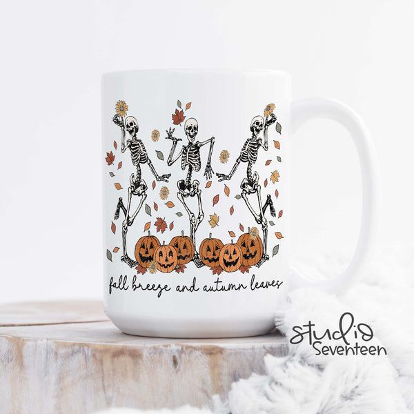 Fall Breeze and Autumn Leaves Halloween Mug with Skeletons and Pumpkins